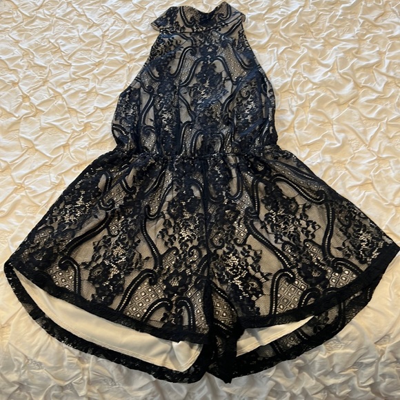 Sexy med lace romper black lace, cream under fabric. Covered buttons open back - Picture 1 of 4